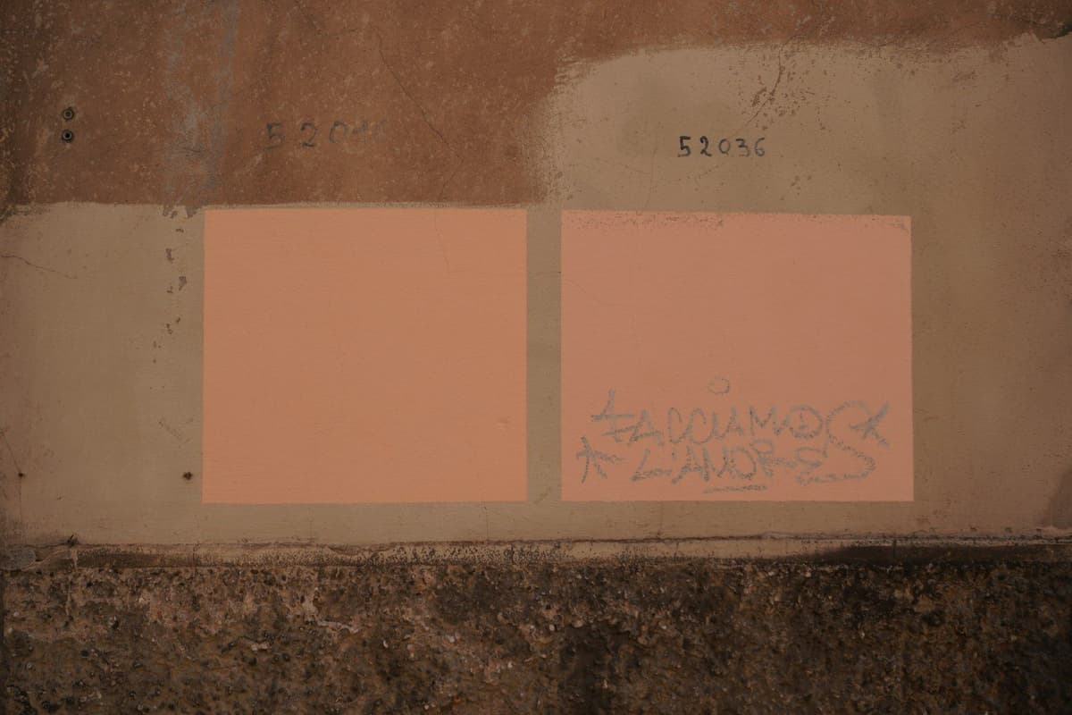 A piece of paper that has been placed on a wall